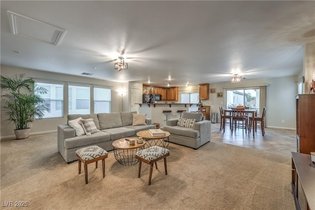 6546 American Flower St, Las Vegas, NV 89148 - living area featuring baseboards and light carpet
