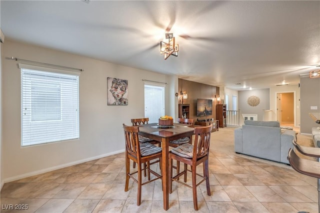 6546 American Flower St, Las Vegas, NV 89148 - dining space featuring light tile patterned floors and baseboards