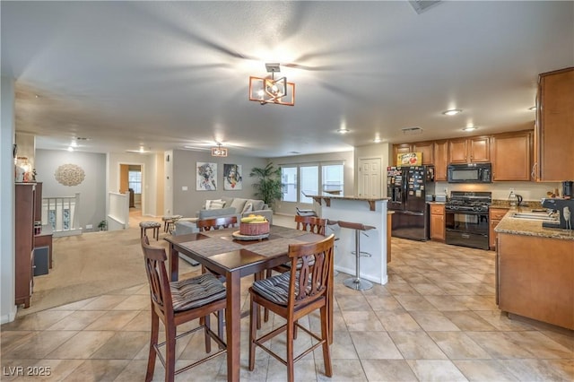 6546 American Flower St, Las Vegas, NV 89148 - dining area with light tile patterned floors