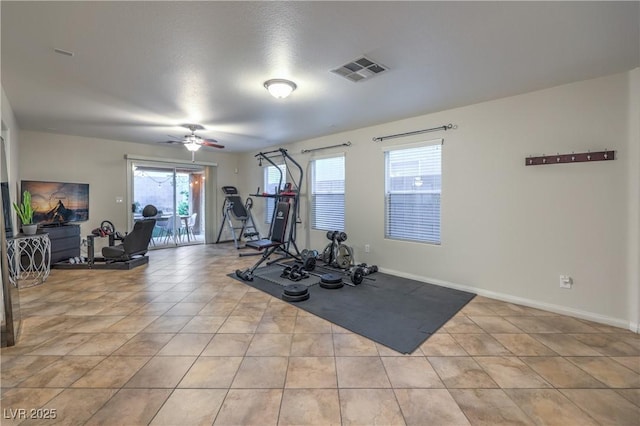 6546 American Flower St, Las Vegas, NV 89148 - workout area with light tile patterned flooring, ceiling fan, and baseboards