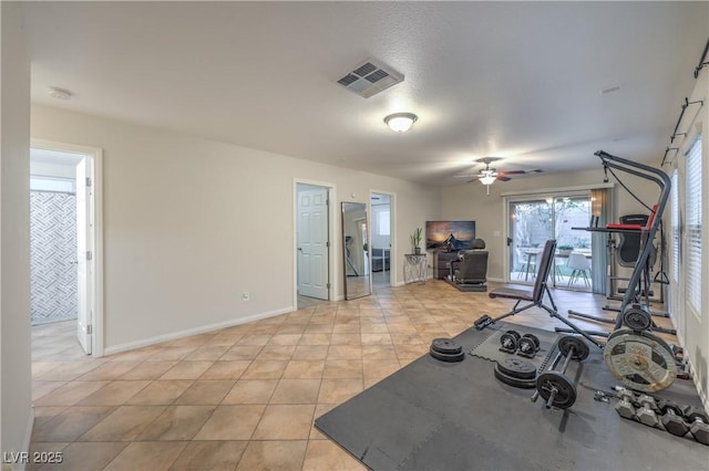 6546 American Flower St, Las Vegas, NV 89148 - exercise area with ceiling fan, light tile patterned floors, and baseboards
