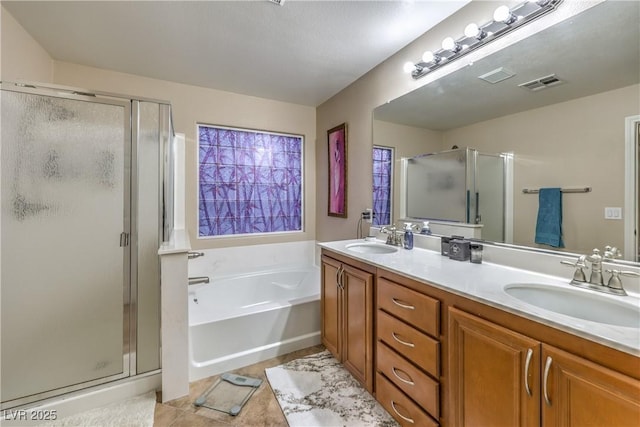 6546 American Flower St, Las Vegas, NV 89148 - bathroom with a stall shower, a bath, double vanity, and tile patterned flooring