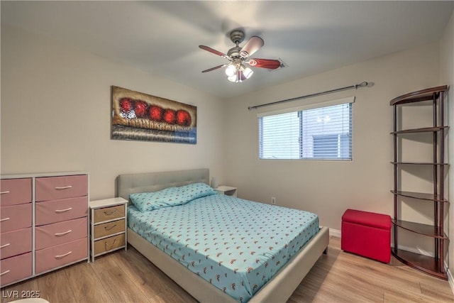 6546 American Flower St, Las Vegas, NV 89148 - bedroom with light wood-type flooring, baseboards, and a ceiling fan