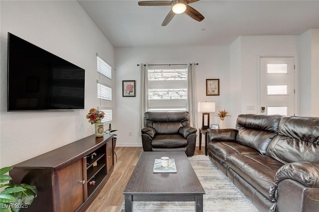 897 Woodburn Ln, Las Vegas, NV 89138 - living area featuring light wood-type flooring and a ceiling fan