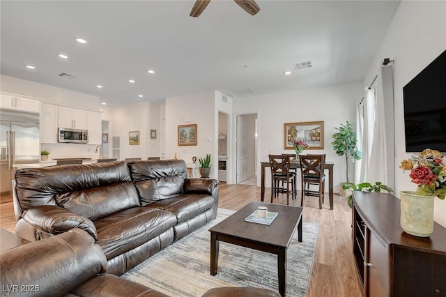 897 Woodburn Ln, Las Vegas, NV 89138 - living room with light wood finished floors, recessed lighting, and a ceiling fan