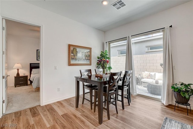 897 Woodburn Ln, Las Vegas, NV 89138 - dining space featuring light wood finished floors and baseboards