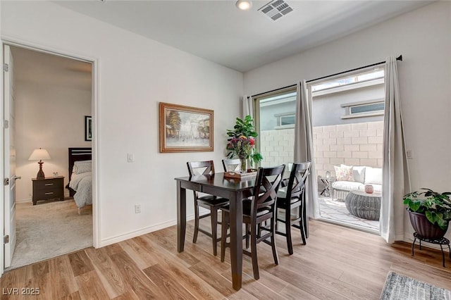 897 Woodburn Ln, Las Vegas, NV 89138 - dining room featuring light wood-style floors and baseboards