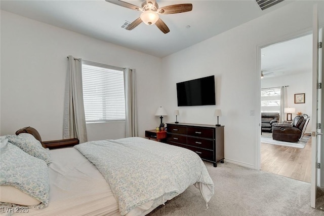 897 Woodburn Ln, Las Vegas, NV 89138 - bedroom featuring light carpet and a ceiling fan