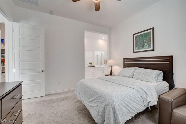 897 Woodburn Ln, Las Vegas, NV 89138 - bedroom with carpet, ensuite bathroom, and ceiling fan