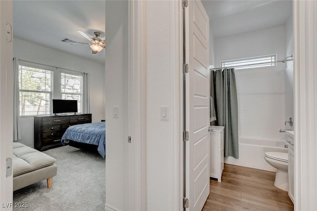 897 Woodburn Ln, Las Vegas, NV 89138 - bedroom featuring light wood-style flooring and a ceiling fan