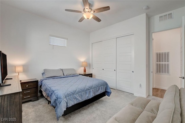 897 Woodburn Ln, Las Vegas, NV 89138 - bedroom featuring light carpet, a closet, and ceiling fan