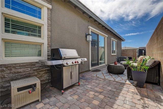 897 Woodburn Ln, Las Vegas, NV 89138 - view of patio with a grill and outdoor lounge area
