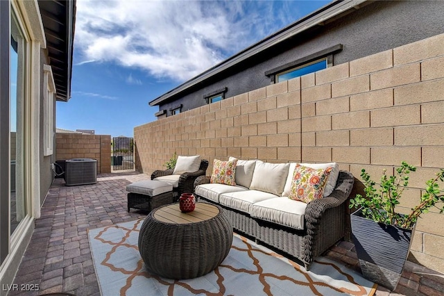 897 Woodburn Ln, Las Vegas, NV 89138 - view of patio with an outdoor hangout area and a gate