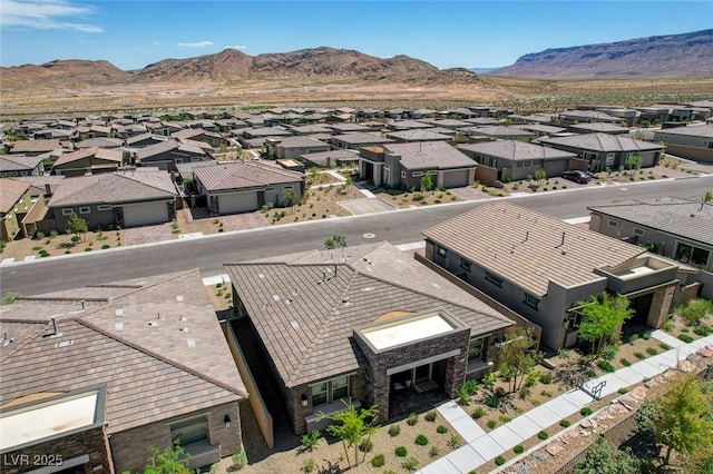 897 Woodburn Ln, Las Vegas, NV 89138 - aerial perspective of suburban area with mountains
