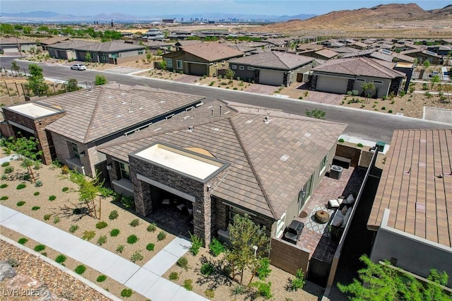 897 Woodburn Ln, Las Vegas, NV 89138 - aerial view of residential area with mountains