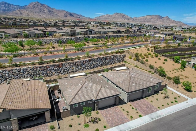 897 Woodburn Ln, Las Vegas, NV 89138 - aerial perspective of suburban area with mountains