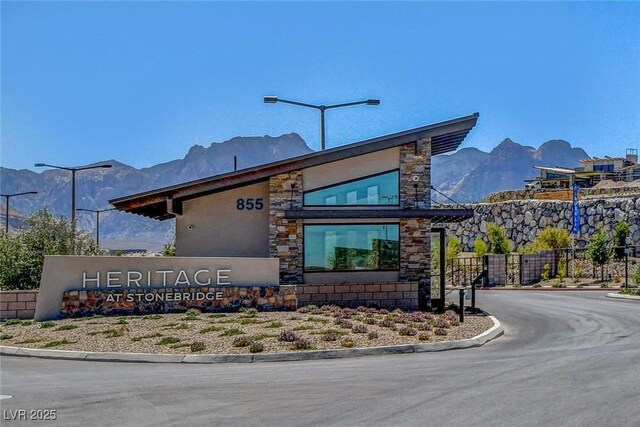 897 Woodburn Ln, Las Vegas, NV 89138 - view of building exterior with a mountain view