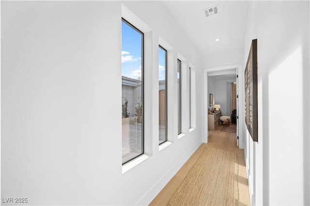 10969 Tranquil Waters Ct, Las Vegas, NV 89135 - corridor featuring light wood finished floors, recessed lighting, and baseboards