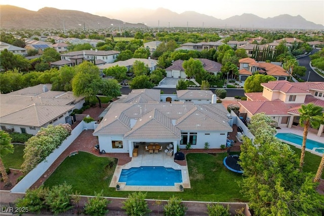 10969 Tranquil Waters Ct, Las Vegas, NV 89135 - aerial view of residential area featuring a pool and a mountainous background