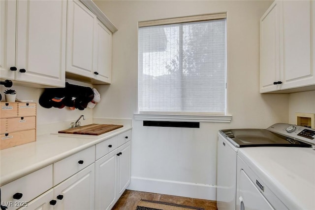 10969 Tranquil Waters Ct, Las Vegas, NV 89135 - washroom with washing machine and dryer and cabinet space