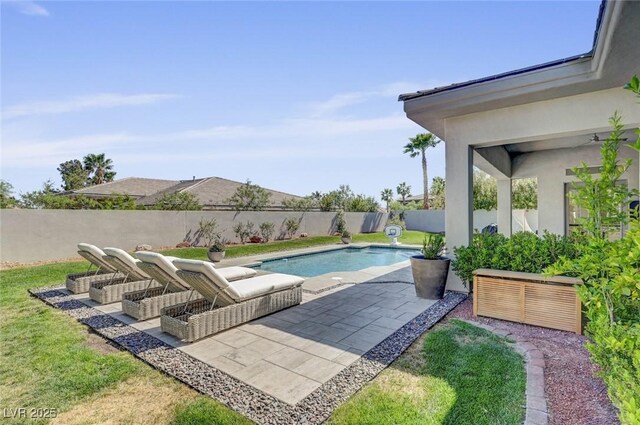 10969 Tranquil Waters Ct, Las Vegas, NV 89135 - view of swimming pool featuring a patio, a fenced backyard, and an outdoor living space