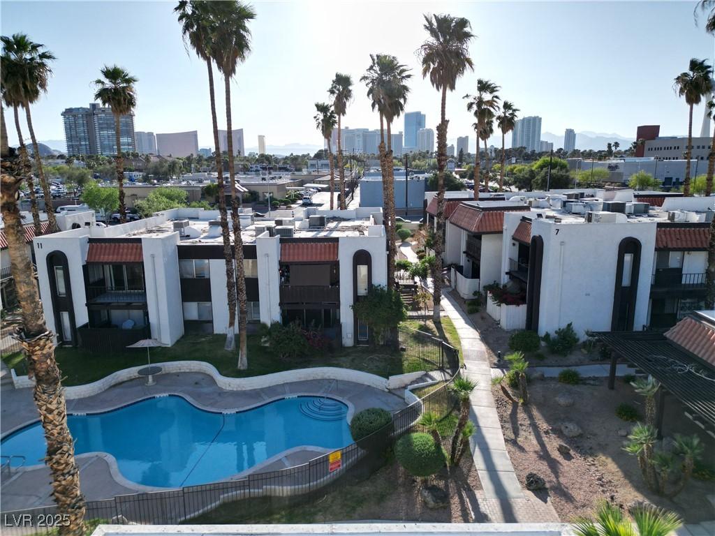 exterior space featuring a view of city and a community pool