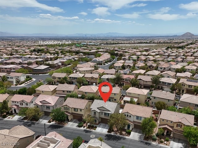aerial view with a residential view and a mountain view