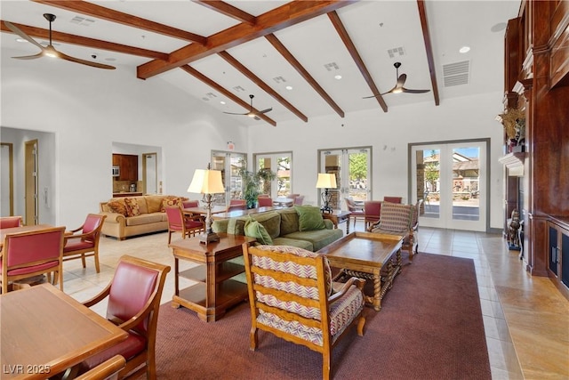 living area featuring beamed ceiling, visible vents, ceiling fan, and recessed lighting
