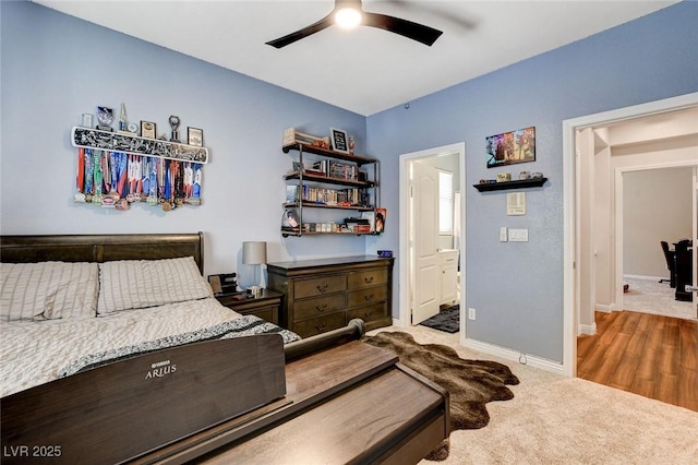 bedroom featuring carpet flooring, baseboards, and a ceiling fan