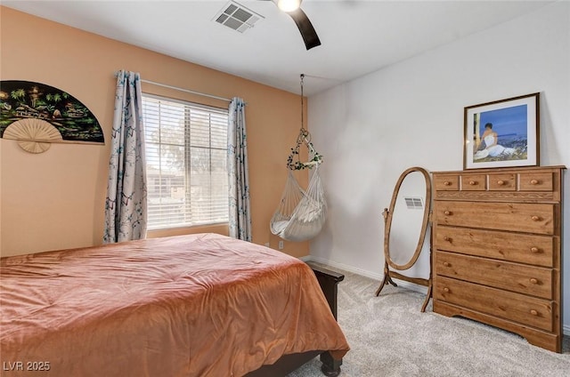 bedroom featuring carpet, baseboards, and ceiling fan