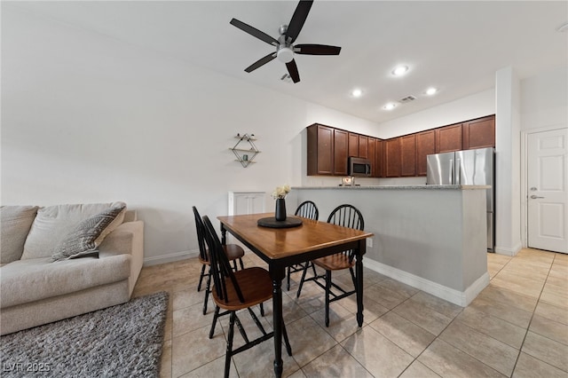 dining space with baseboards, recessed lighting, visible vents, ceiling fan, and light tile patterned floors