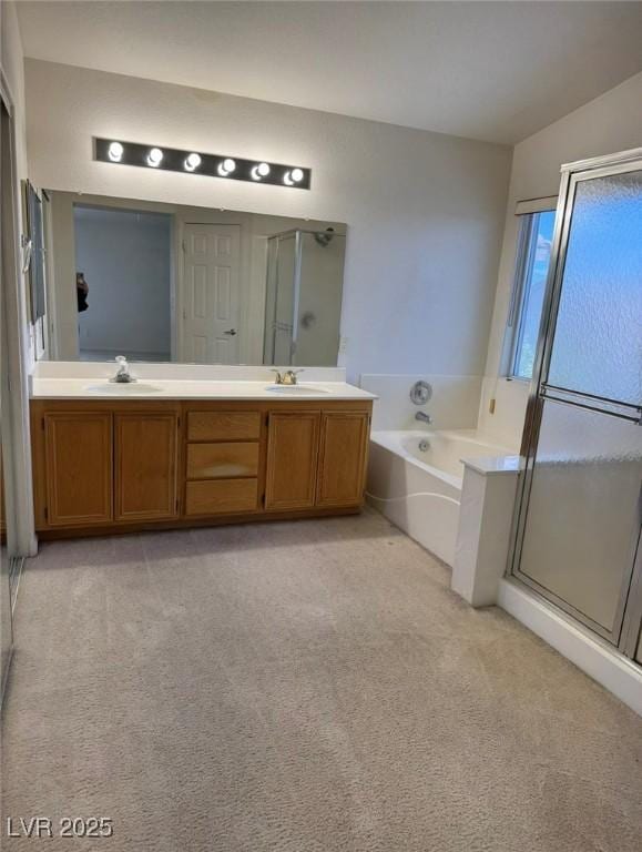 bathroom with carpet floors, double vanity, a bath, a sink, and a stall shower