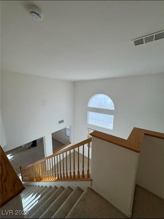 stairs featuring visible vents