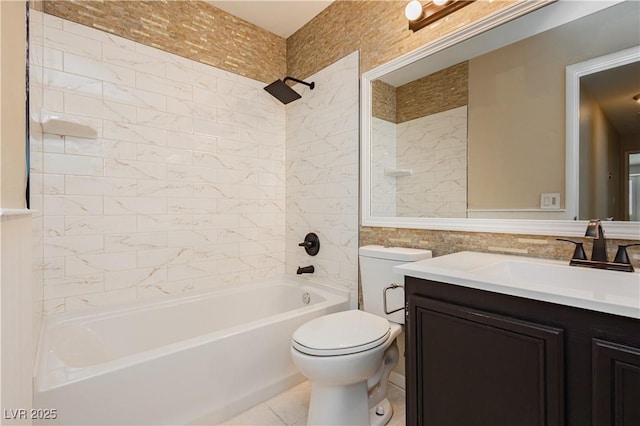 bathroom featuring vanity, toilet, bathing tub / shower combination, and tile walls