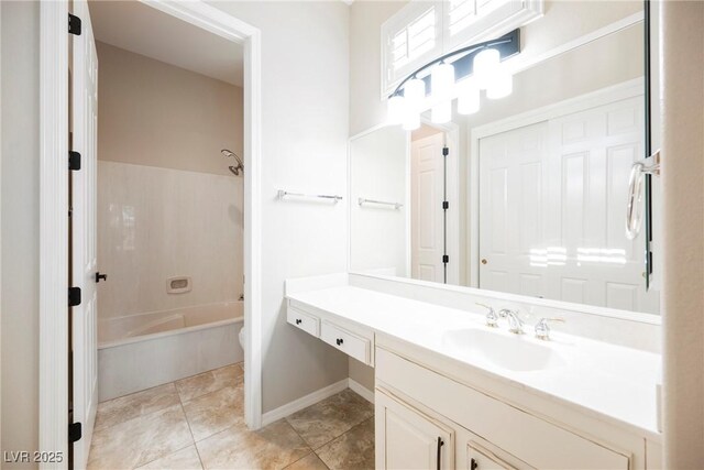 full bath featuring tile patterned flooring, shower / bathing tub combination, toilet, vanity, and baseboards