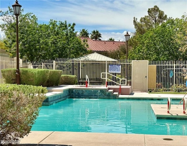pool featuring fence