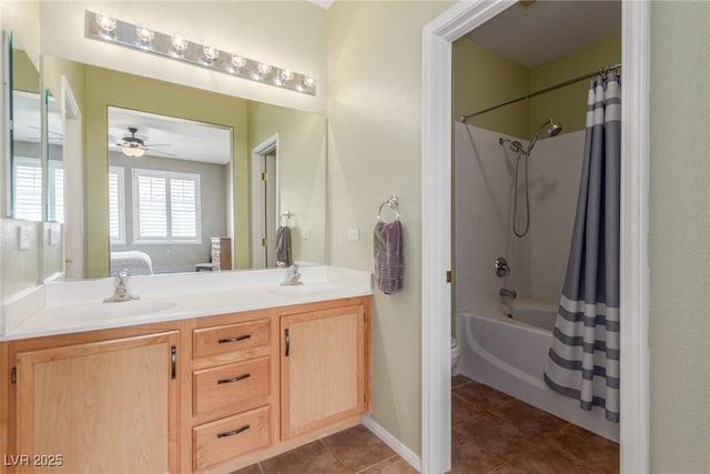 bathroom featuring tile patterned flooring, a sink, double vanity, and ensuite bath