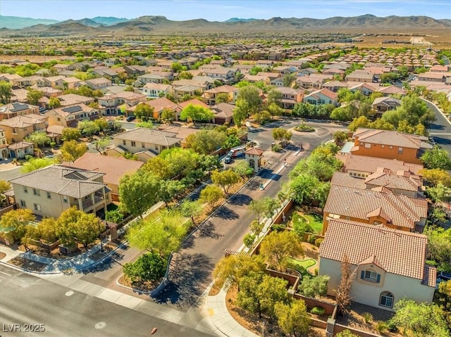 drone / aerial view with a residential view and a mountain view