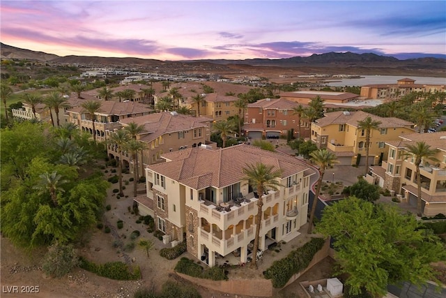 birds eye view of property featuring a residential view and a mountain view