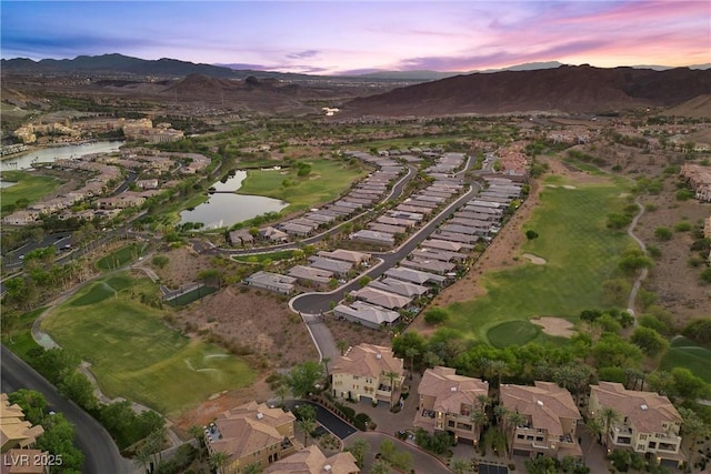 aerial view featuring a residential view, view of golf course, and a water and mountain view