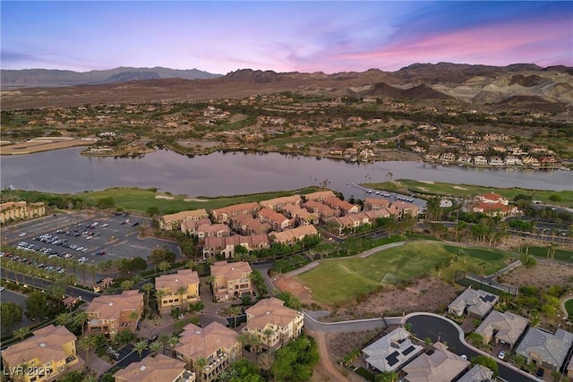 bird's eye view featuring a water and mountain view and a residential view