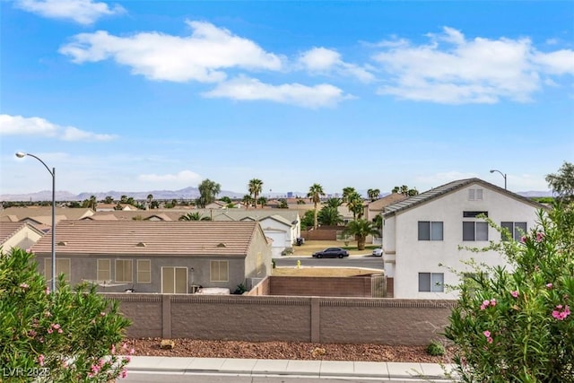 3217 Palladio Ave, North Las Vegas, NV 89031 - fenced yard featuring a residential view and a mountain view
