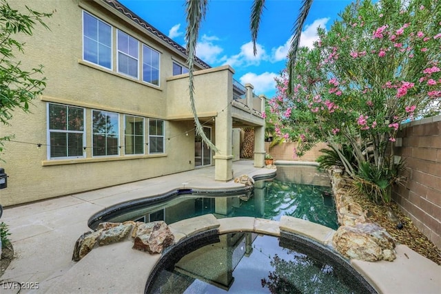 3217 Palladio Ave, North Las Vegas, NV 89031 - view of swimming pool with a fenced backyard, a patio, and a pool with connected hot tub
