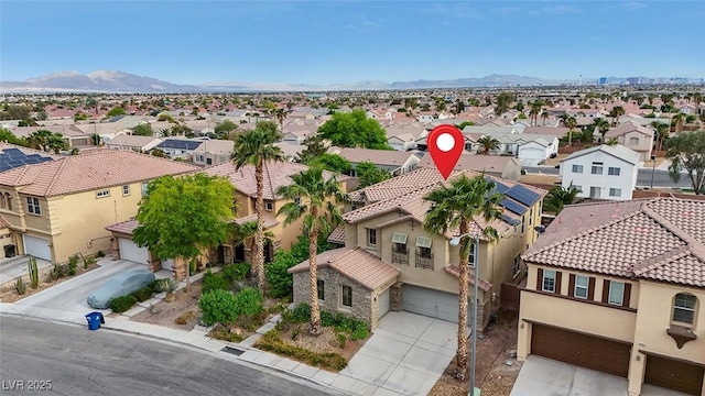 3217 Palladio Ave, North Las Vegas, NV 89031 - aerial perspective of suburban area featuring mountains