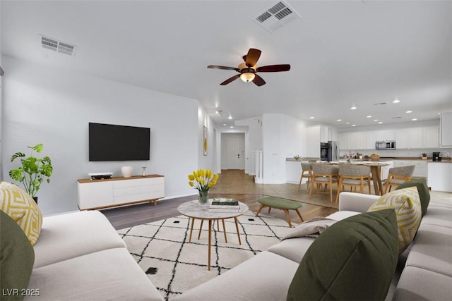 3217 Palladio Ave, North Las Vegas, NV 89031 - living room featuring light wood-style flooring, recessed lighting, and ceiling fan