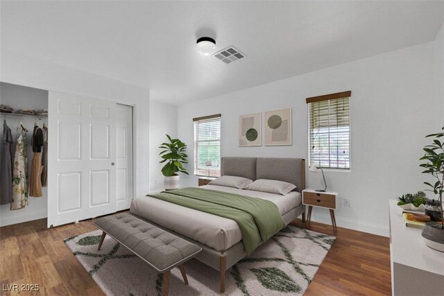 3217 Palladio Ave, North Las Vegas, NV 89031 - bedroom featuring wood finished floors and a closet