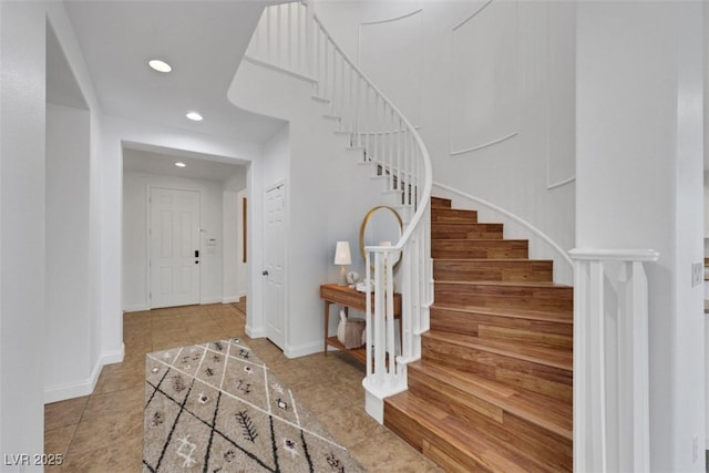 3217 Palladio Ave, North Las Vegas, NV 89031 - stairway with recessed lighting and tile patterned floors