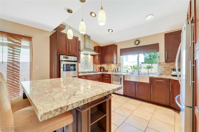 3920 Autumn St, Las Vegas, NV 89120 - kitchen featuring appliances with stainless steel finishes, wall chimney range hood, a sink, decorative backsplash, and recessed lighting