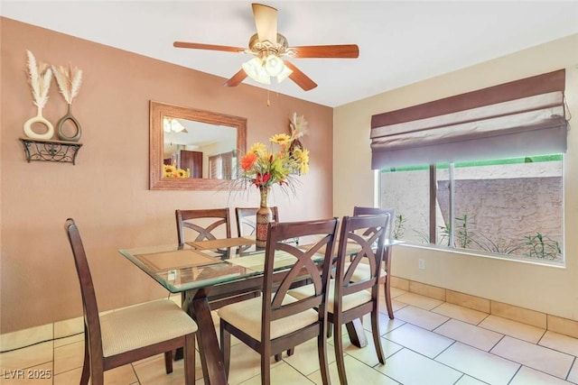 3920 Autumn St, Las Vegas, NV 89120 - dining area with ceiling fan, light tile patterned floors, and baseboards