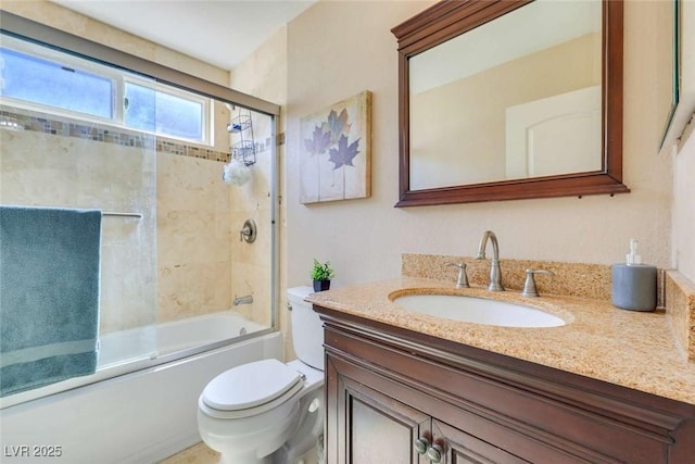 3920 Autumn St, Las Vegas, NV 89120 - bathroom featuring vanity, toilet, and shower / bath combination with glass door